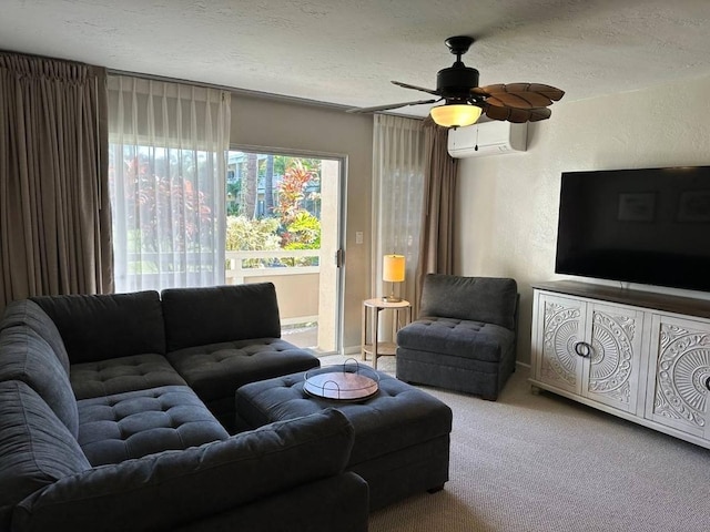 living room with ceiling fan, a textured ceiling, light carpet, and a wall mounted air conditioner