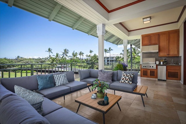 view of patio / terrace featuring sink, an outdoor kitchen, an outdoor living space, and grilling area