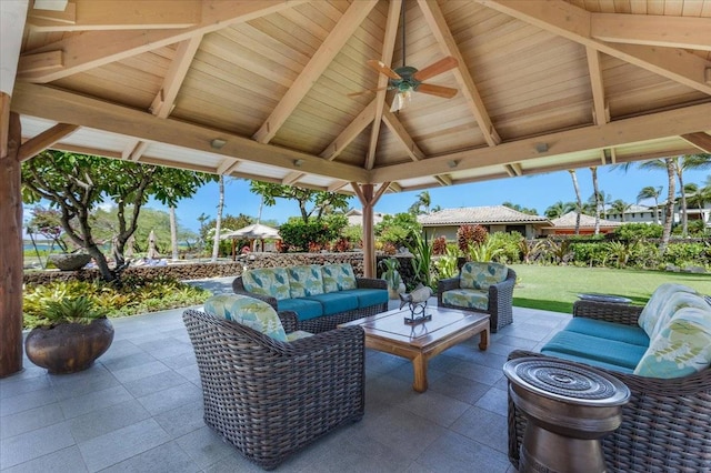 view of patio featuring a gazebo, outdoor lounge area, and ceiling fan