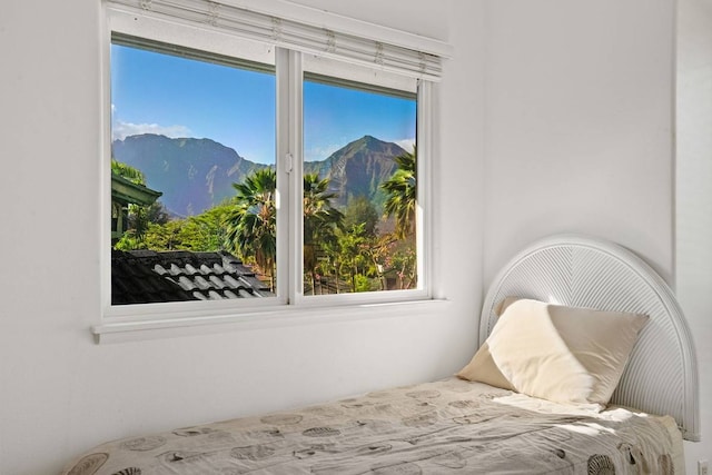 bedroom with a mountain view