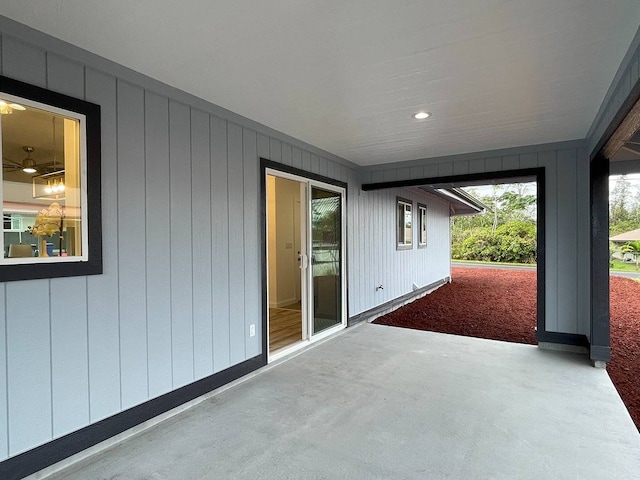 exterior space featuring ceiling fan