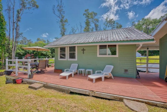 rear view of house with a deck