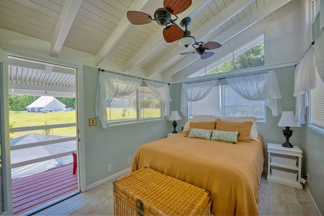 bedroom with vaulted ceiling with beams and ceiling fan