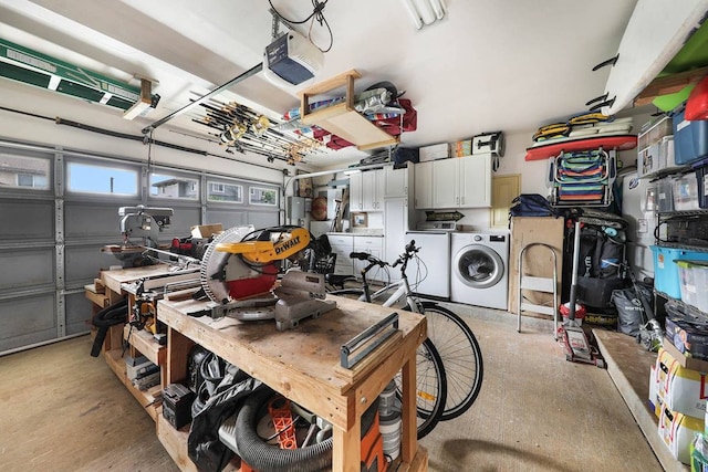 garage with washer / clothes dryer and a garage door opener