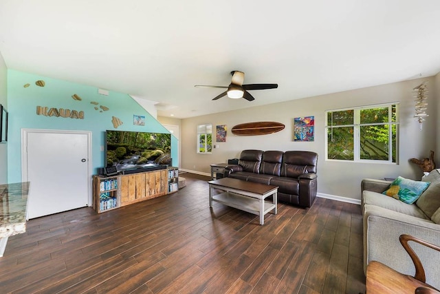 living room with ceiling fan and dark hardwood / wood-style floors