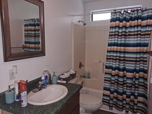 full bathroom with shower / tub combo, toilet, and large vanity