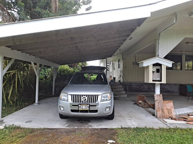 view of parking / parking lot with a carport