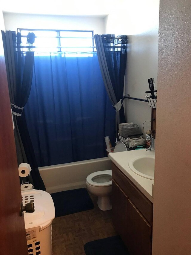 full bathroom with toilet, vanity, shower / tub combo with curtain, and parquet floors