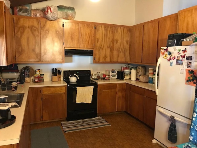 kitchen featuring white refrigerator, sink, electric range, and dark parquet flooring