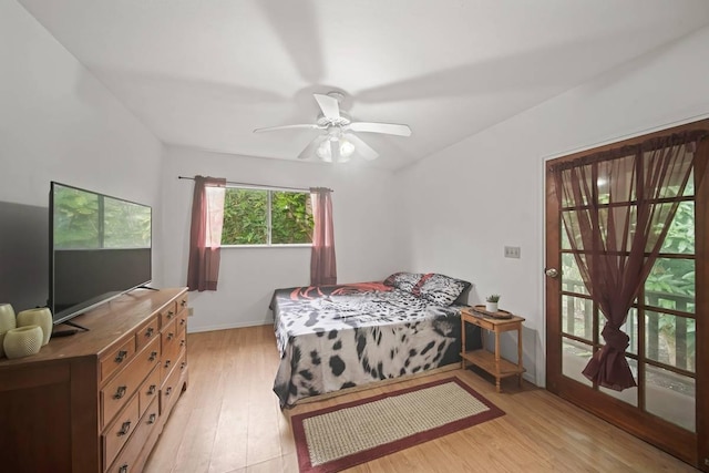 bedroom featuring light wood-type flooring and ceiling fan