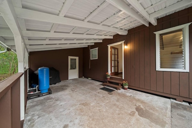 view of patio / terrace featuring a baseboard heating unit