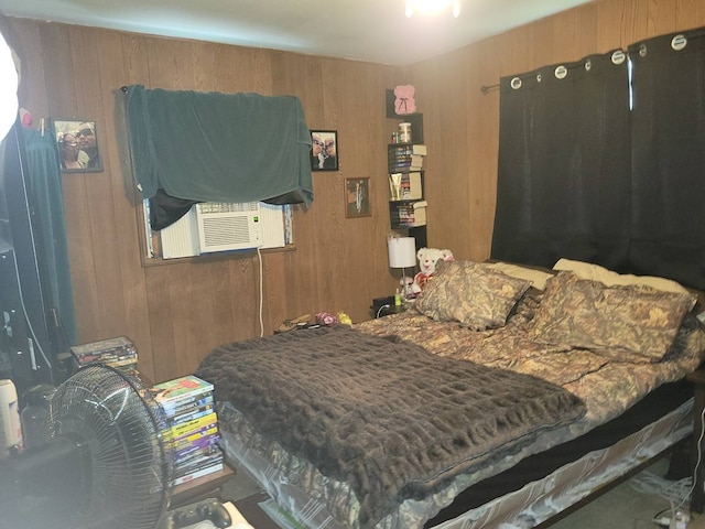 bedroom featuring wood walls