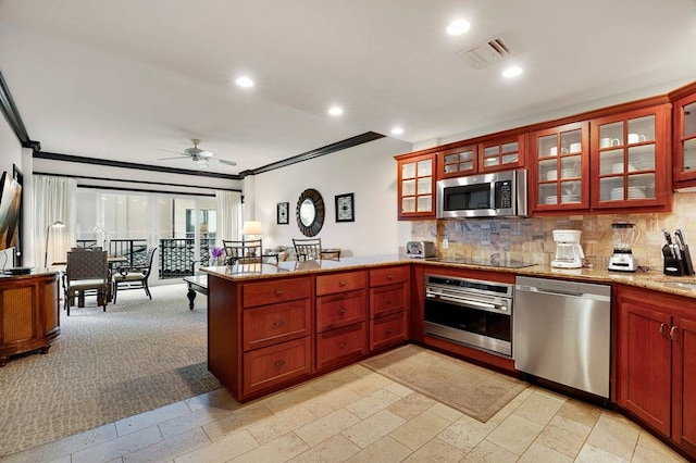 kitchen with ceiling fan, appliances with stainless steel finishes, light tile floors, and light stone countertops