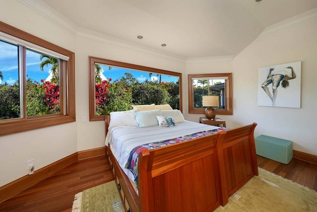 bedroom featuring light hardwood / wood-style flooring and crown molding