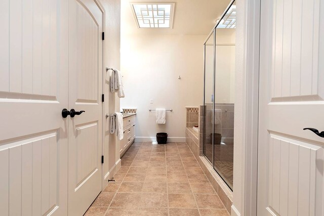 bathroom with separate shower and tub, tile flooring, and vanity