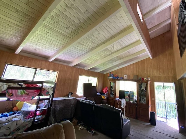 living room featuring wooden ceiling, carpet, vaulted ceiling with beams, and wooden walls