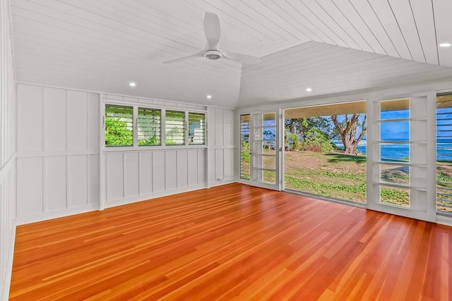 unfurnished sunroom featuring ceiling fan and wooden ceiling