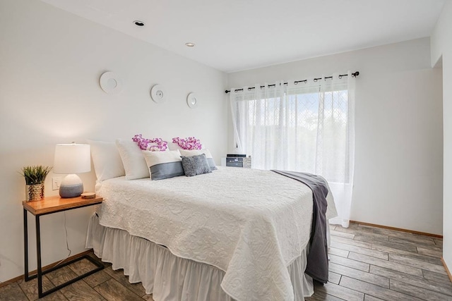 bedroom featuring hardwood / wood-style floors