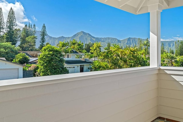 balcony featuring a mountain view