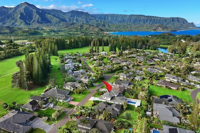 aerial view with a water and mountain view