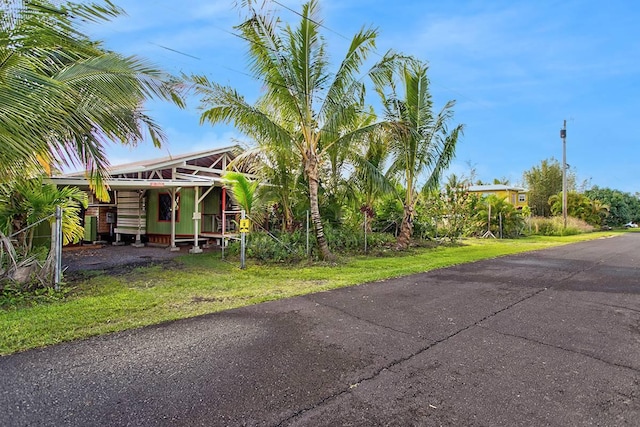 exterior space featuring a carport