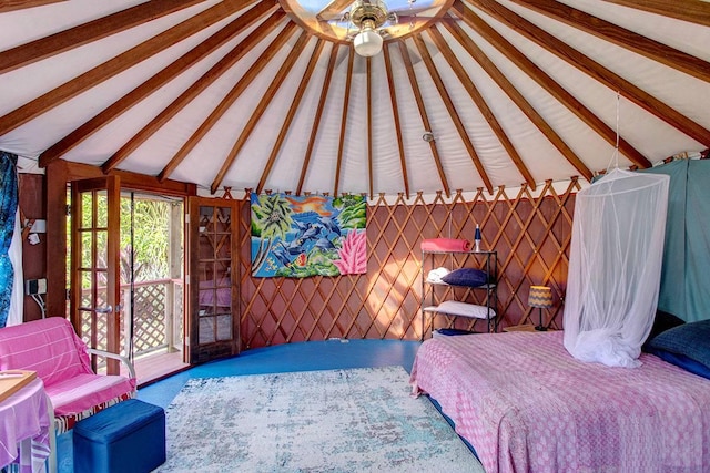 bedroom featuring lofted ceiling