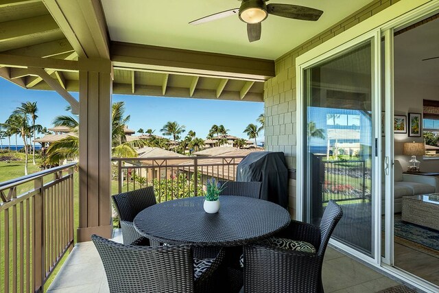 balcony featuring ceiling fan