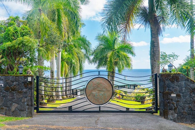 view of gate featuring a water view