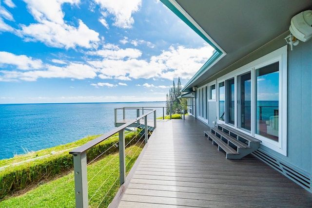 exterior space with a water view and a yard