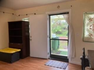 doorway featuring light hardwood / wood-style flooring