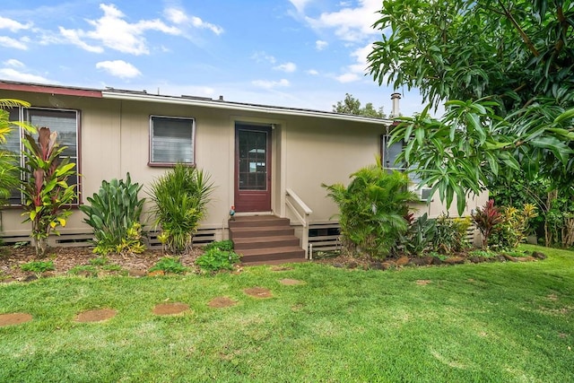 view of front of home featuring a front yard