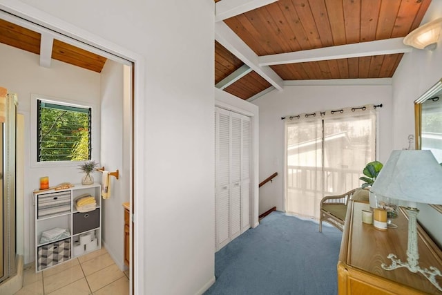 corridor featuring wooden ceiling, lofted ceiling with beams, and light carpet