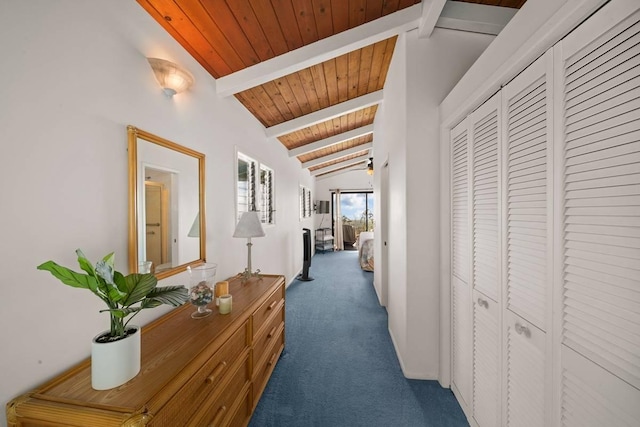 hallway featuring carpet, vaulted ceiling with beams, and wood ceiling