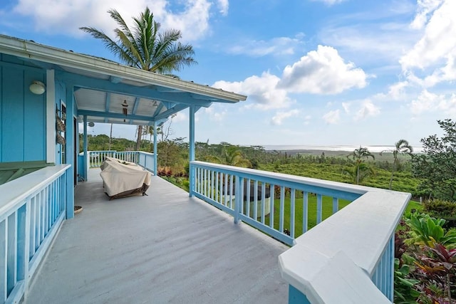 view of patio / terrace featuring covered porch and a water view