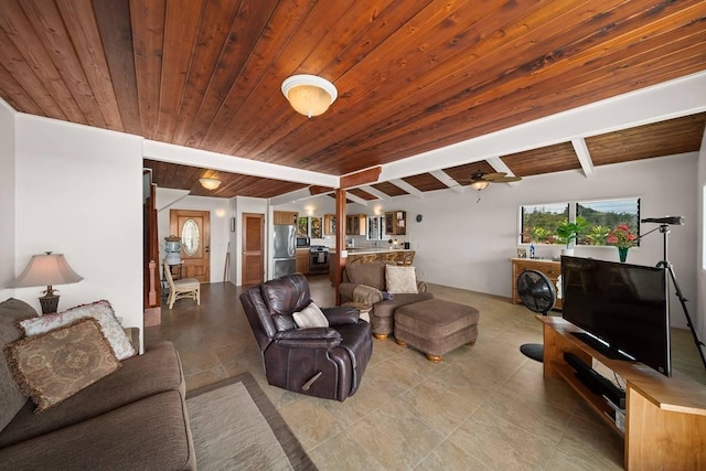 tiled living room featuring vaulted ceiling with beams, ceiling fan, and wooden ceiling