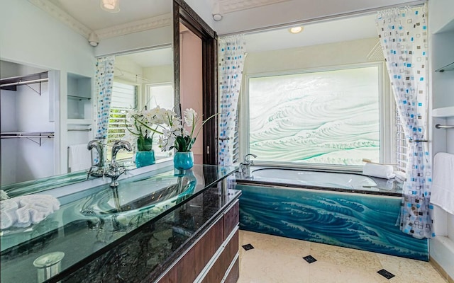 bathroom with vanity, crown molding, and shower / bath combo with shower curtain