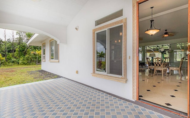 view of patio / terrace featuring ceiling fan