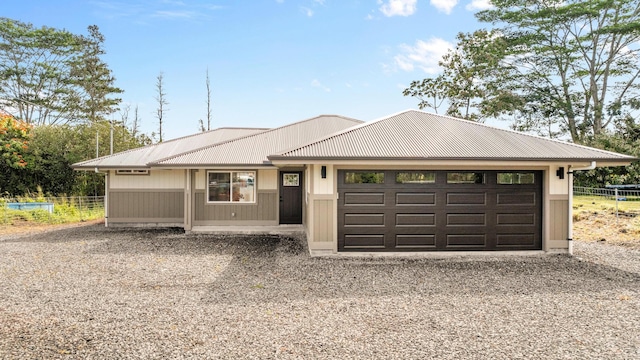 single story home with a garage