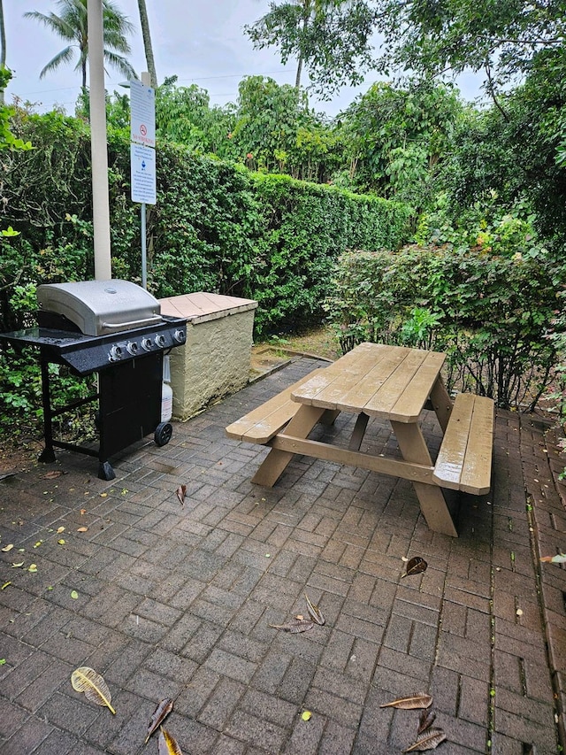 view of patio with a grill