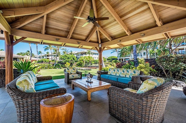 view of patio with a gazebo, outdoor lounge area, and ceiling fan