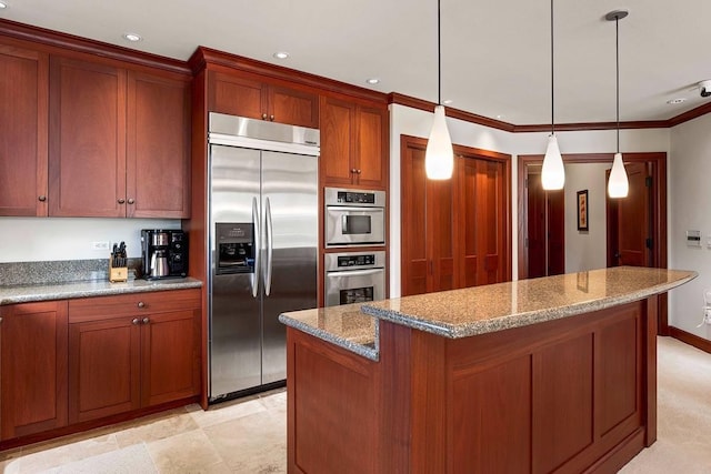 kitchen with crown molding, decorative light fixtures, built in fridge, a kitchen island, and light stone countertops