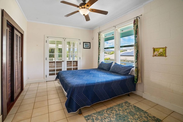 bedroom featuring french doors, crown molding, light tile flooring, and ceiling fan