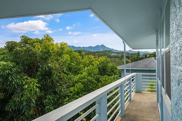 balcony featuring a mountain view