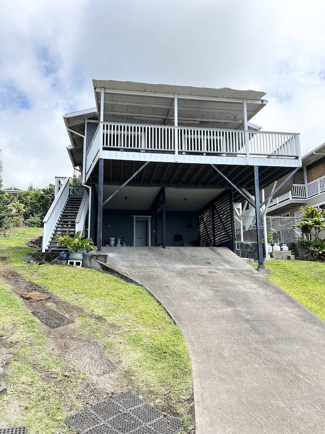 exterior space featuring a front yard and a deck