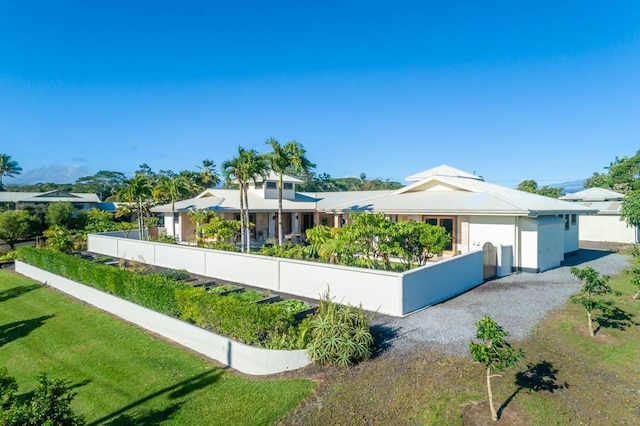 view of front of home with a front yard