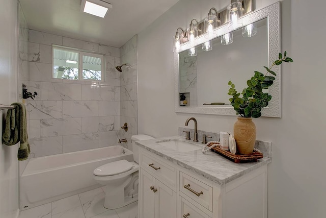 full bathroom featuring vanity, tile flooring, toilet, and tiled shower / bath