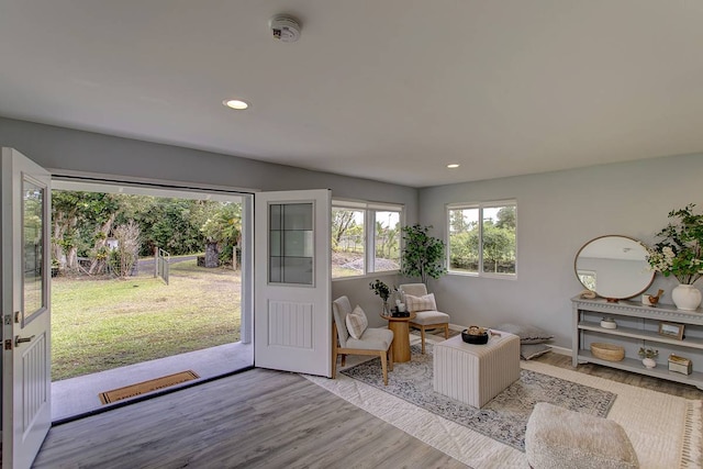 sitting room with light hardwood / wood-style flooring