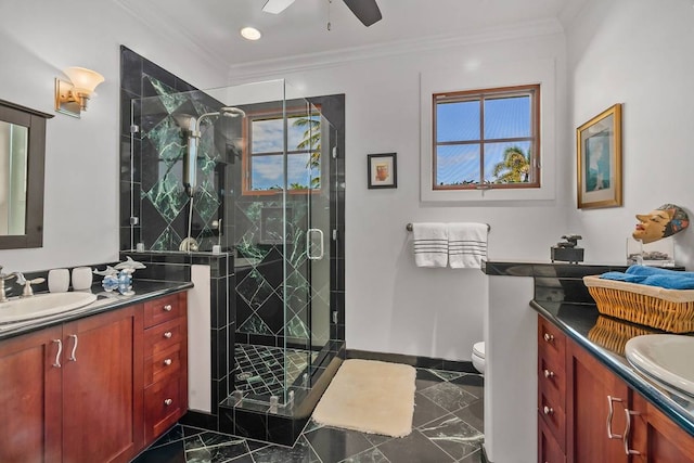 bathroom featuring walk in shower, toilet, vanity, and ceiling fan