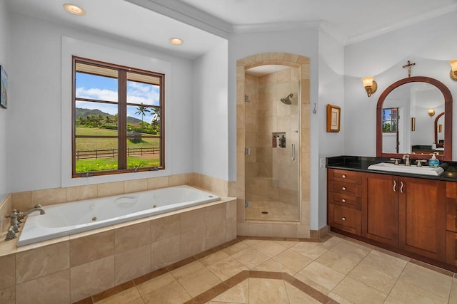 bathroom featuring ornamental molding, tile flooring, plus walk in shower, and vanity