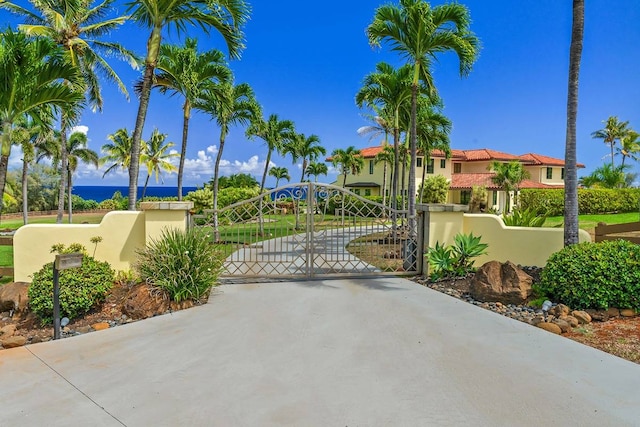 view of gate featuring a water view